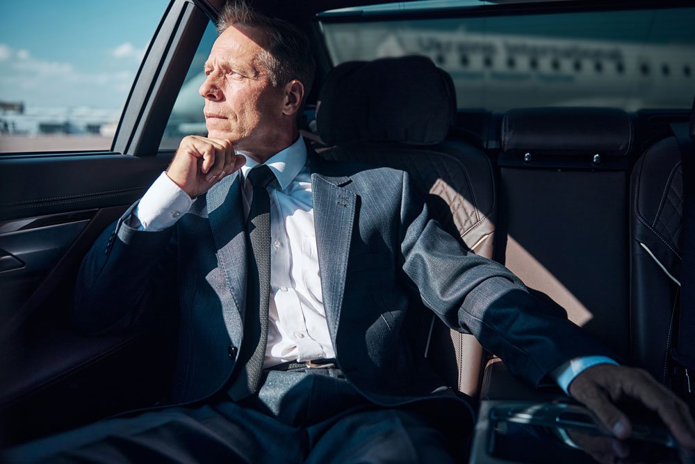 Business Man In Car Woodland